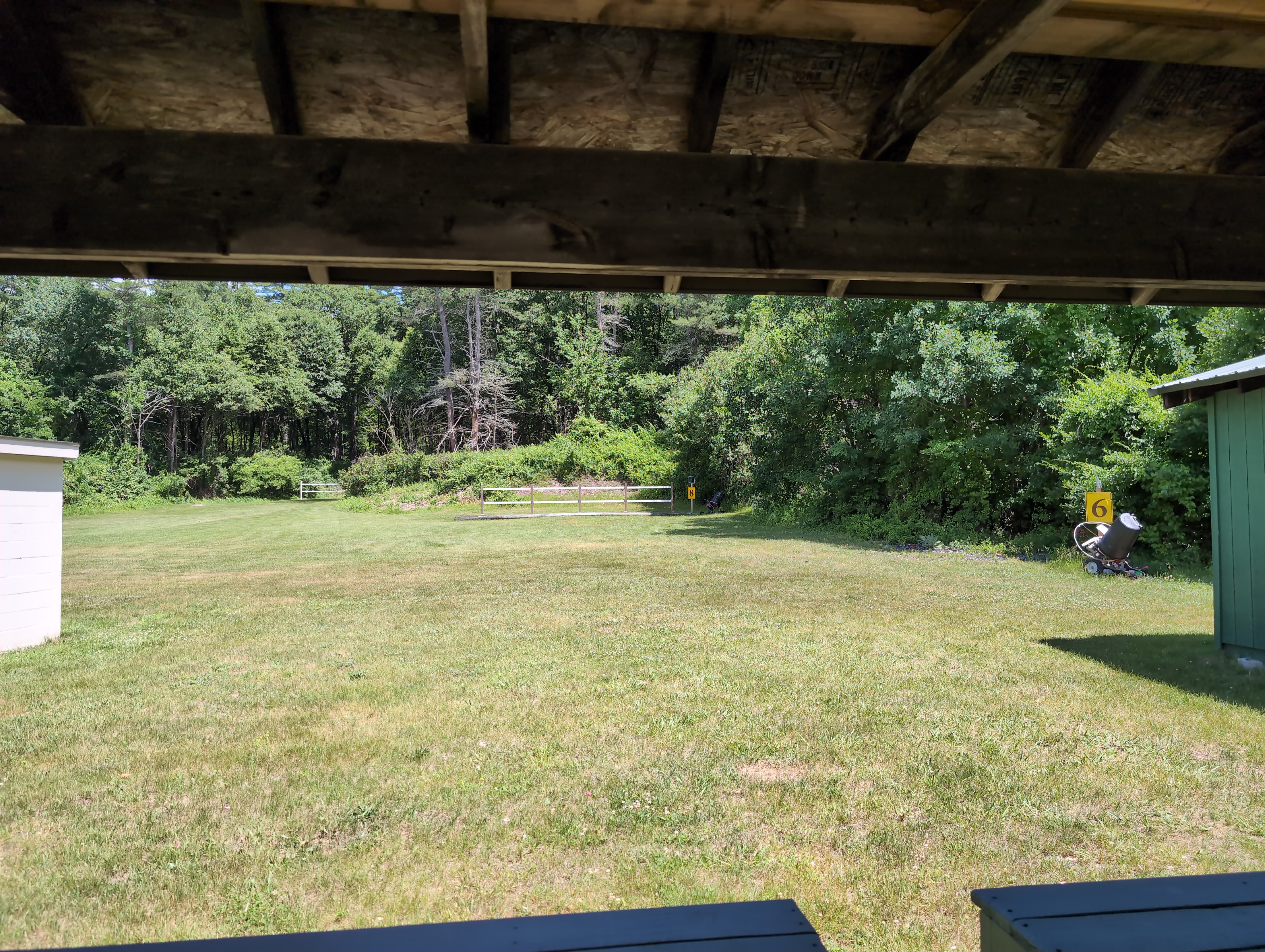 Downrange view toward the 50-yard backstop berm